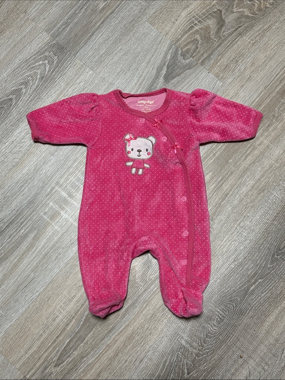 Cozy Pink Plush Footed Baby One-Piece with Bear Appliqué